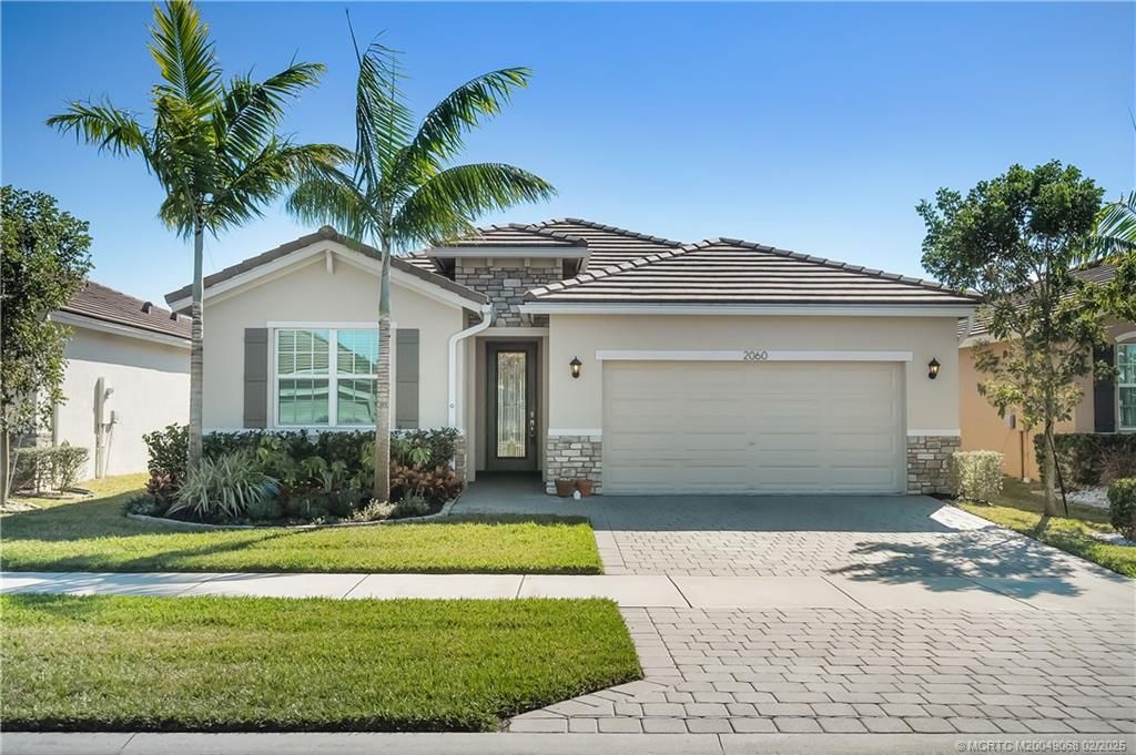 Photo of 2060 NW Golden Oak Trail, Jensen Beach, FL 34957 (MLS # M20049068)
