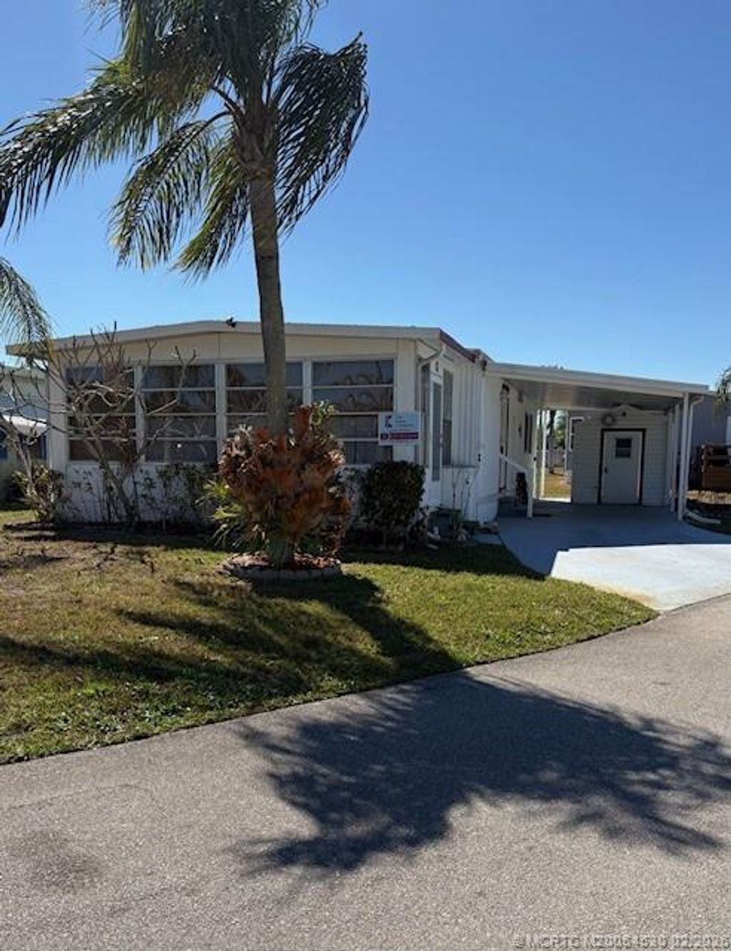Photo of 11 Cozumel Lane, Port Saint Lucie, FL 34952 (MLS # M20054530)