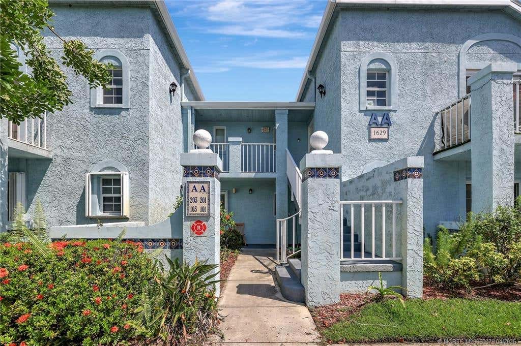 Photo of 1629 SE Green Acres Circle #AA201, Port Saint Lucie, FL 34952 (MLS # M20050079)