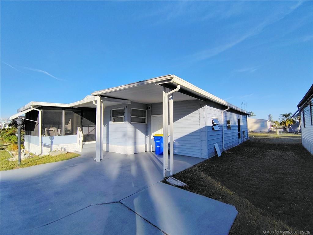 Photo of 2581 SW Pontiac Place, Stuart, FL 34997 (MLS # M20053556)