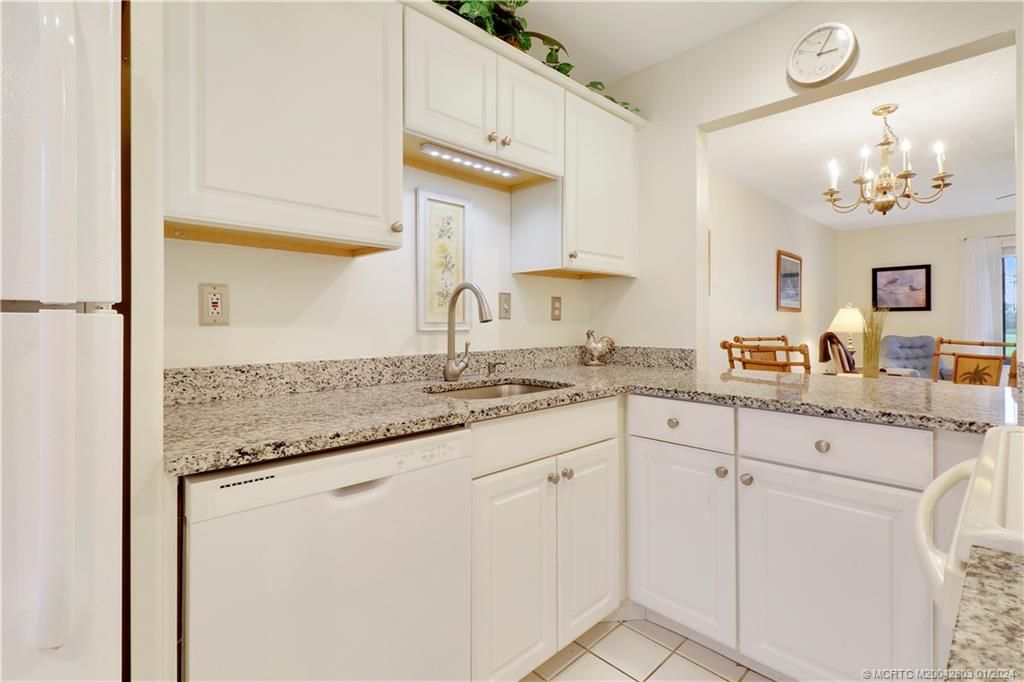 Photo of 5313 SE Miles Grant Road #211, Stuart, FL 34997 (MLS # M20042803)