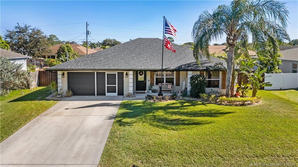 Photo of 3259 SW Crumpacker Street, Port Saint Lucie, FL 34953 (MLS # M20053161)