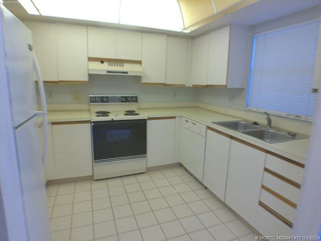 Photo of 841 SW South River Drive #106, Stuart, FL 34997 (MLS # M20047477)