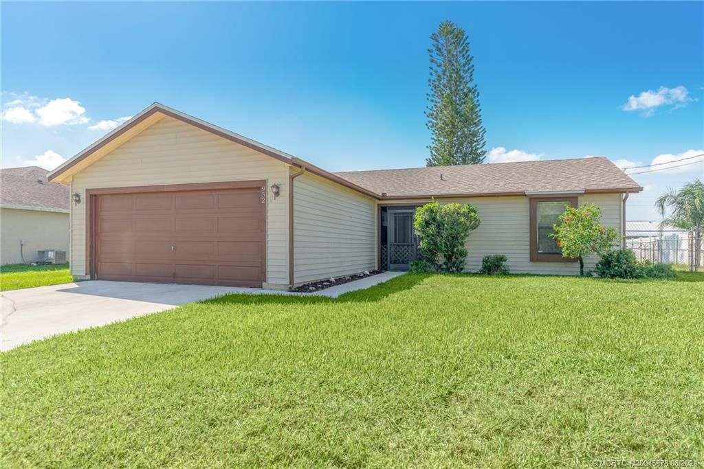 Photo of 952 SW Mccomkle Avenue, Port Saint Lucie, FL 34953 (MLS # M20045878)