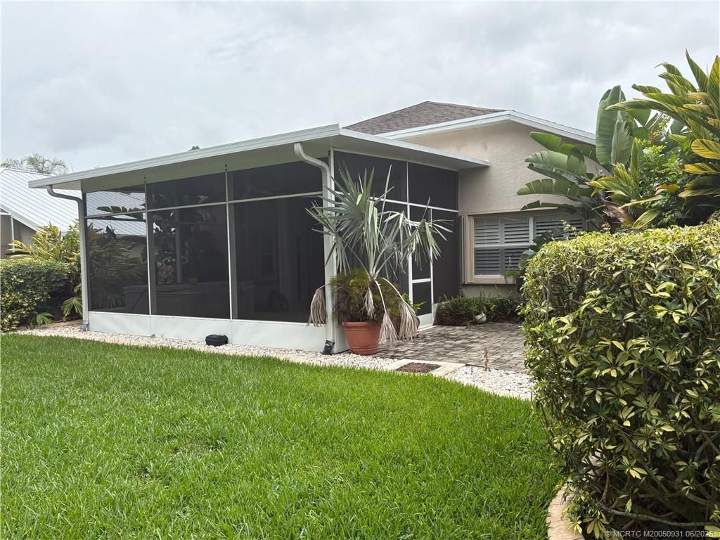 Photo of 475 NW Fetterbush Way, Jensen Beach, FL 34957 (MLS # M20050931)