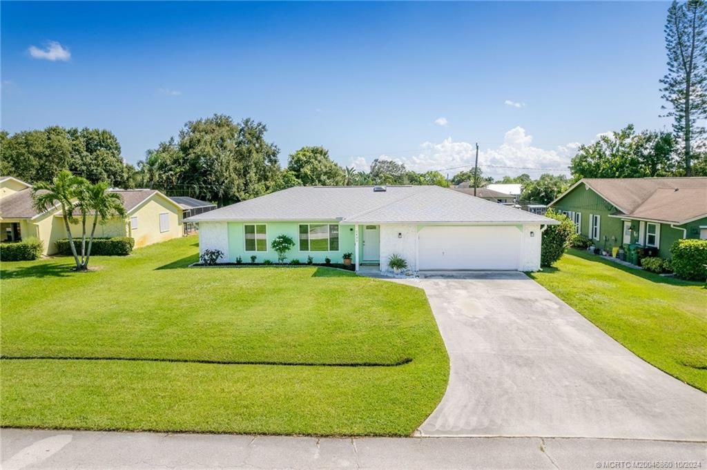 Photo of 2432 SE Caligula Avenue, Port Saint Lucie, FL 34952 (MLS # M20046860)