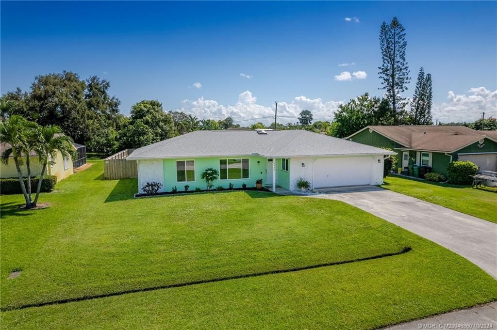 Photo of 2432 SE Caligula Avenue, Port Saint Lucie, FL 34952 (MLS # M20046860)