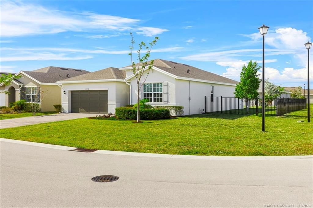 Photo of 2731 NE Breezeway Circle, Jensen Beach, FL 34957 (MLS # M20048111)