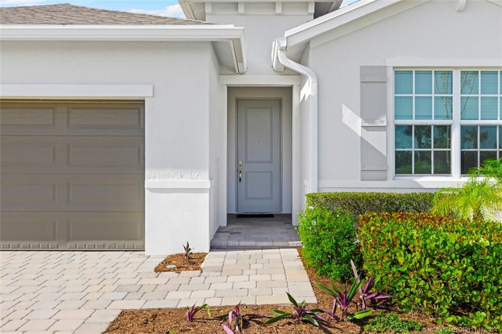 Photo of 2731 NE Breezeway Circle, Jensen Beach, FL 34957 (MLS # M20048111)