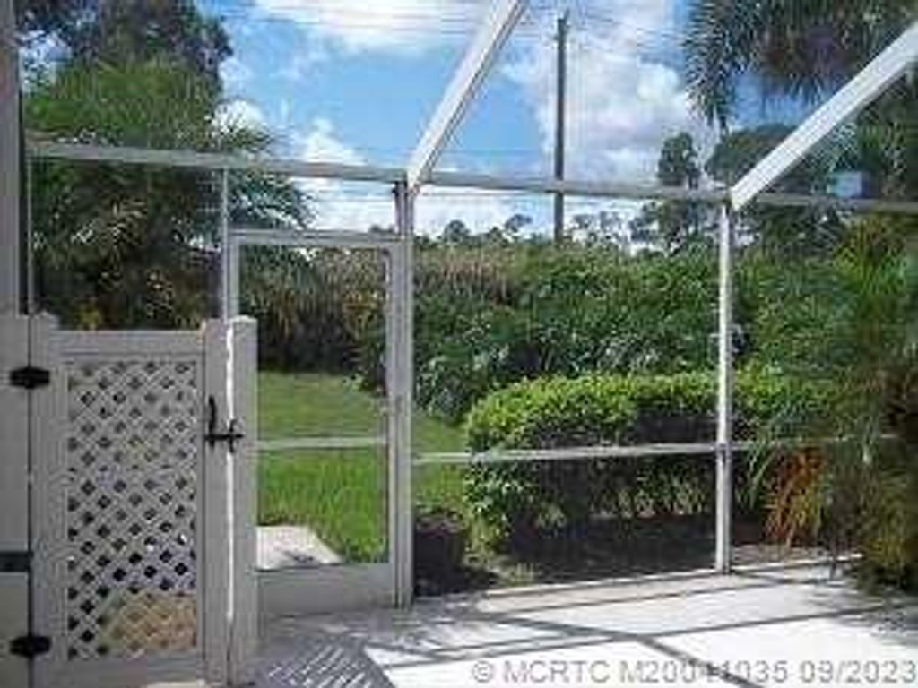 Photo of 3249 SW Sunset Trace Circle, Palm City, FL 34996 (MLS # M20041035)