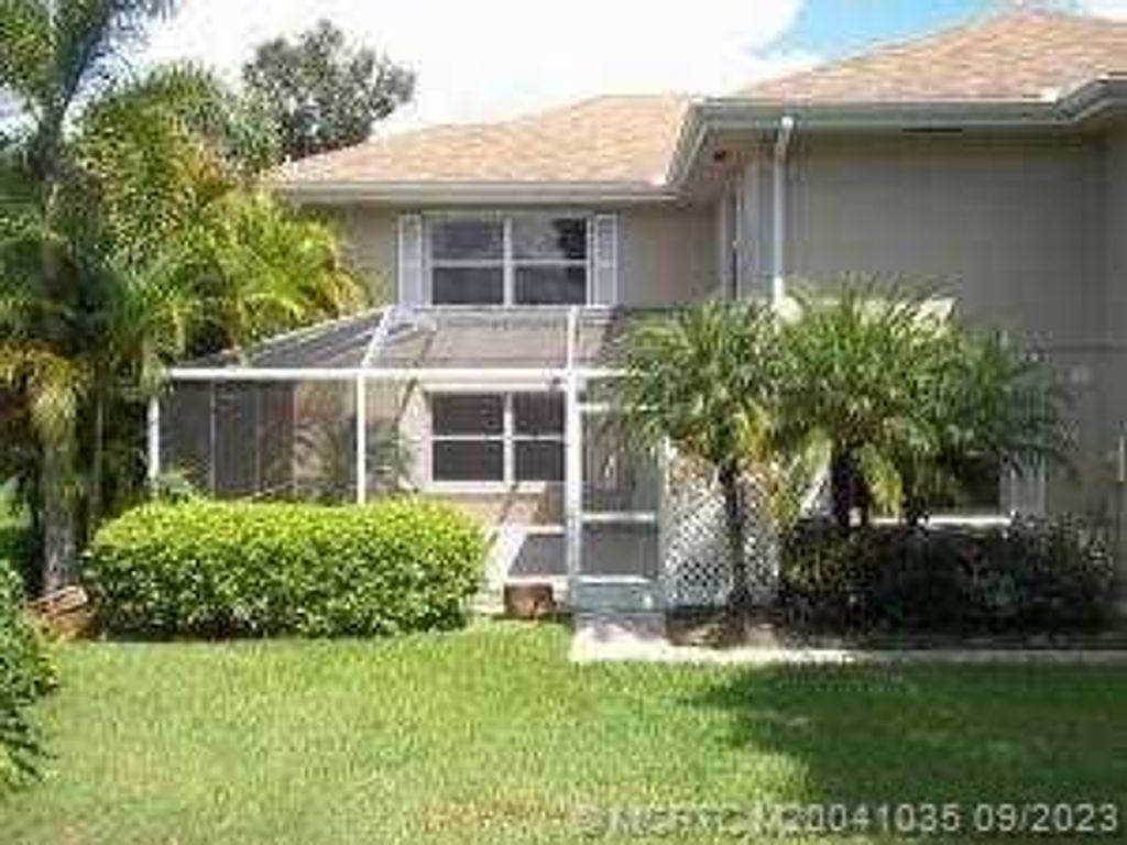 Photo of 3249 SW Sunset Trace Circle, Palm City, FL 34996 (MLS # M20041035)