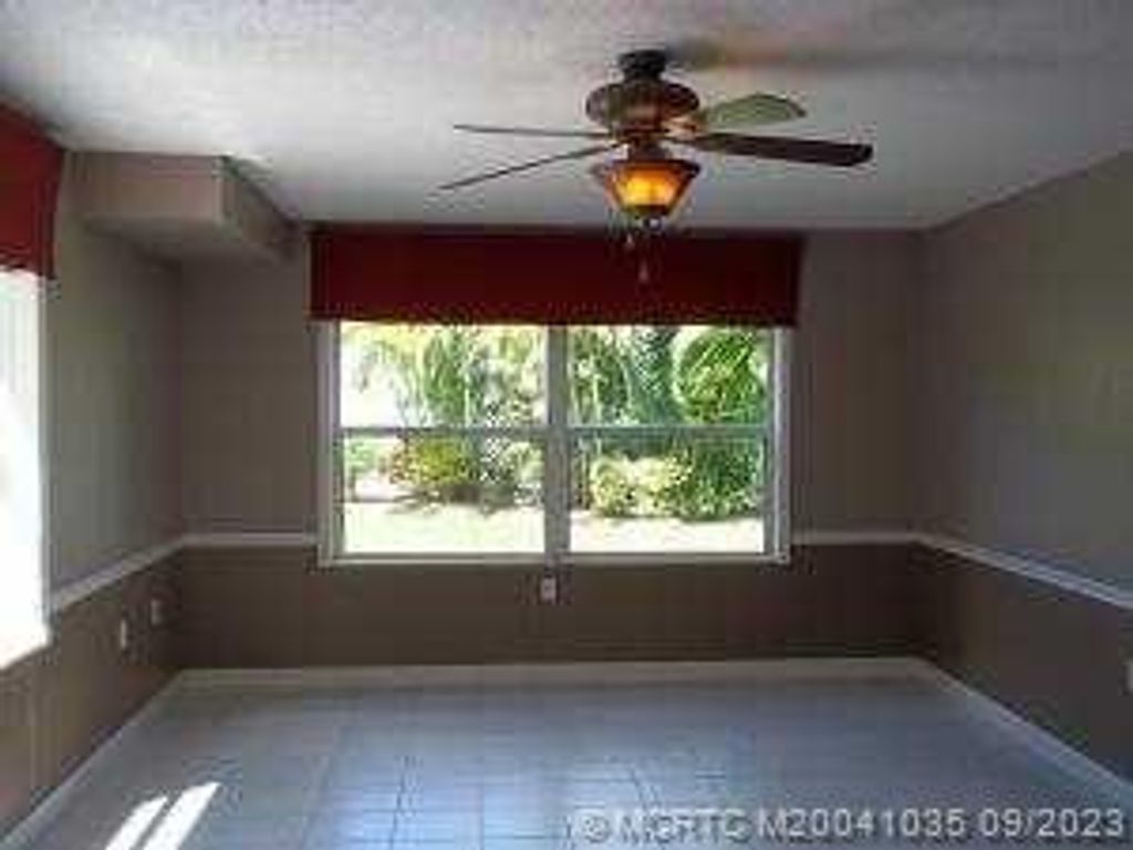 Photo of 3249 SW Sunset Trace Circle, Palm City, FL 34996 (MLS # M20041035)