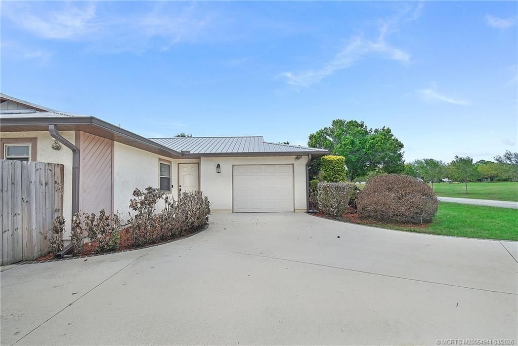 Photo of 542 NW La Brea Avenue, Port Saint Lucie, FL 34983 (MLS # M20054941)