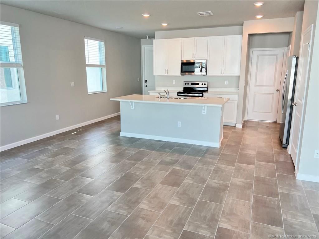 Photo of 255 Osprey Preserve Boulevard, Jensen Beach, FL 34957 (MLS # M20038193)