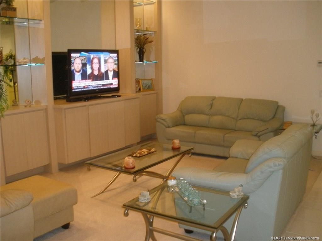 Photo of 1652 SW Waterfall Boulevard, Palm City, FL 34990 (MLS # M20039504)