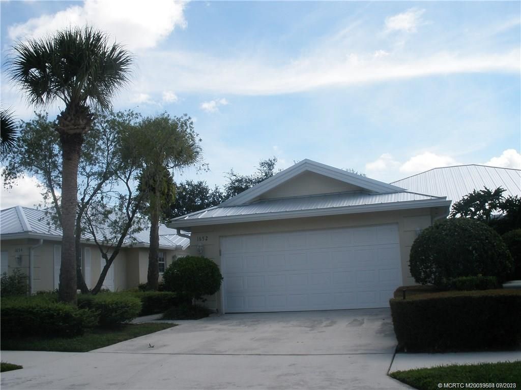 Photo of 1652 SW Waterfall Boulevard, Palm City, FL 34990 (MLS # M20039504)