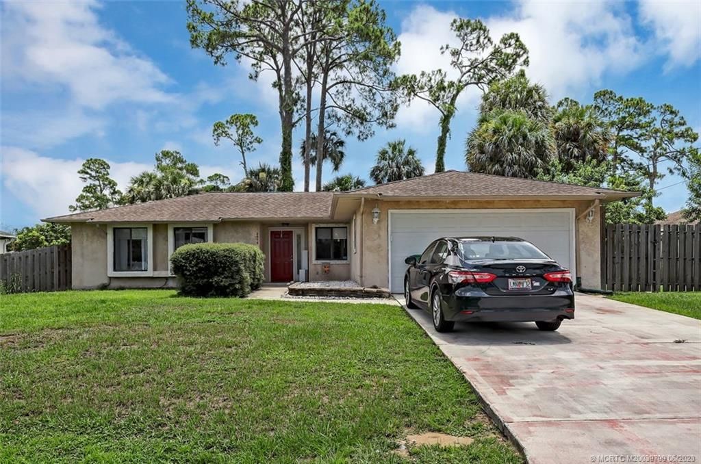 Photo of 2573 SW Cain Street, Port Saint Lucie, FL 34953 (MLS # M20039799)