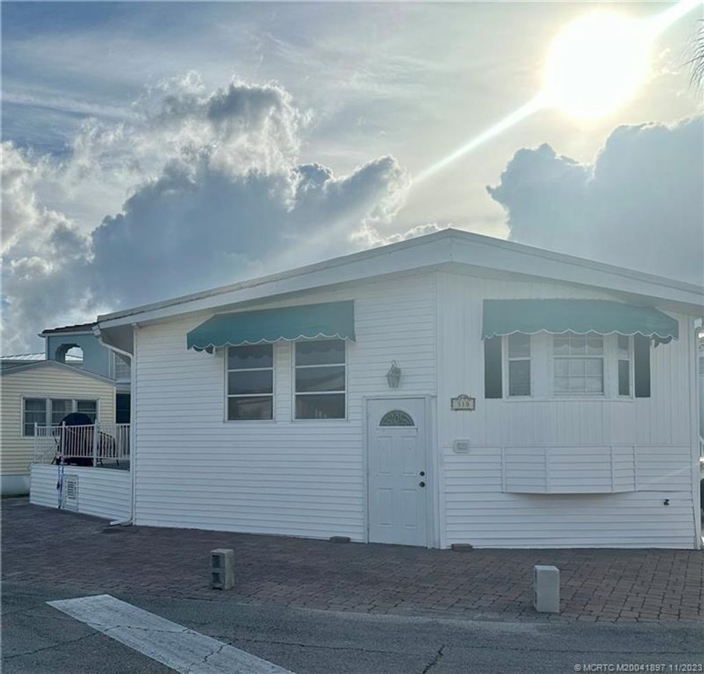 Photo of 310 Nettles Boulevard, Jensen Beach, FL 34957 (MLS # M20041897)