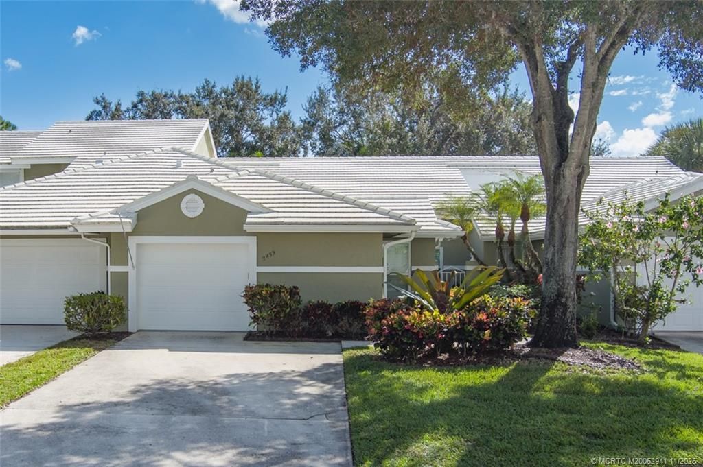 Photo of 2433 SW Foxpoint Trail, Palm City, FL 34990 (MLS # M20052941)