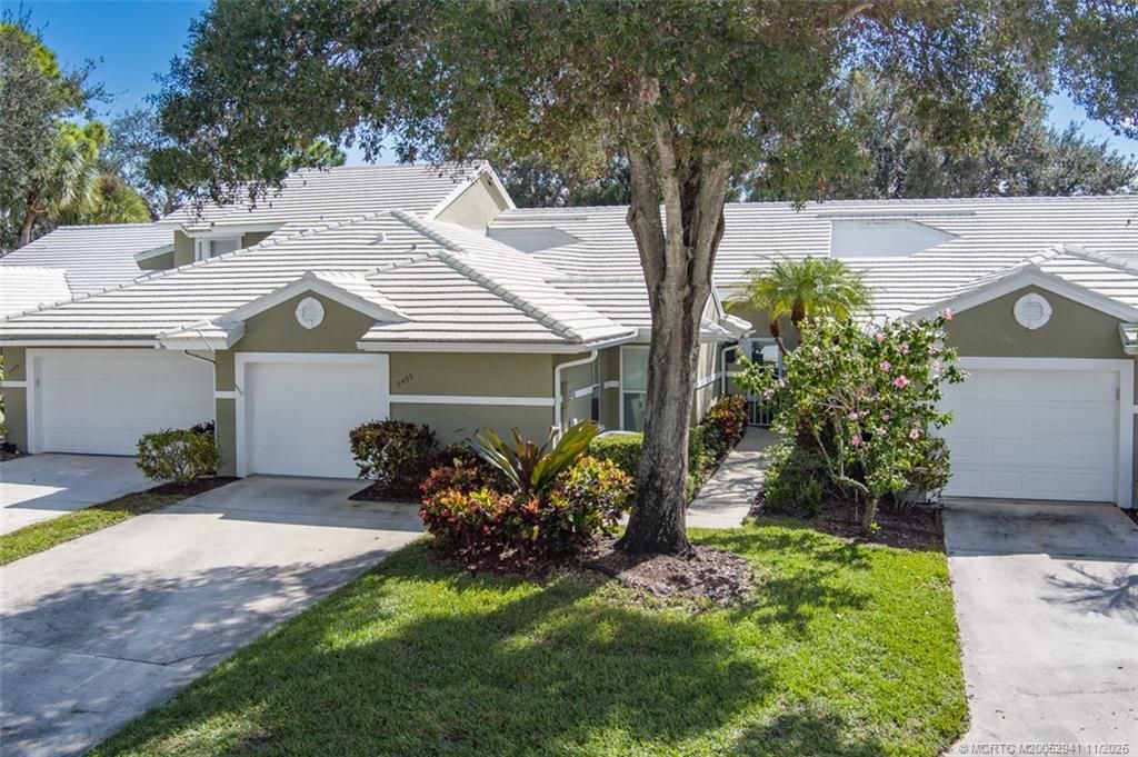 Photo of 2433 SW Foxpoint Trail, Palm City, FL 34990 (MLS # M20052941)