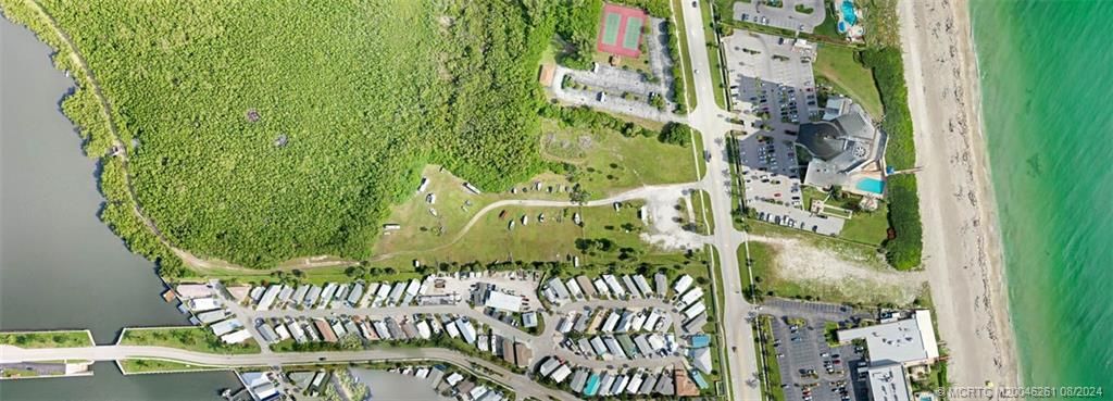 Photo of 9750 S Ocean Drive, Jensen Beach, FL 34957 (MLS # M20046261)