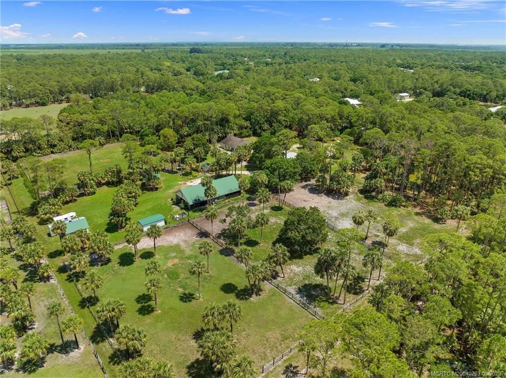 Photo of 5051 SW Markel St, Palm City, FL 34990 (MLS # M20040783)