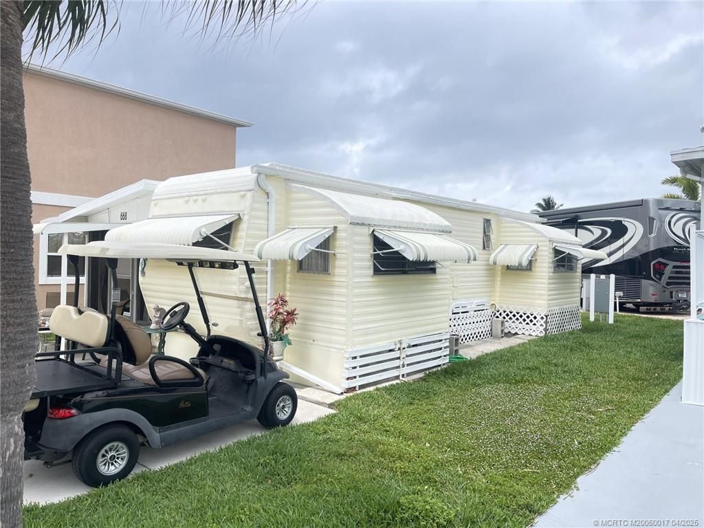 Photo of 668 Nettles Boulevard, Jensen Beach, FL 34957 (MLS # M20050017)