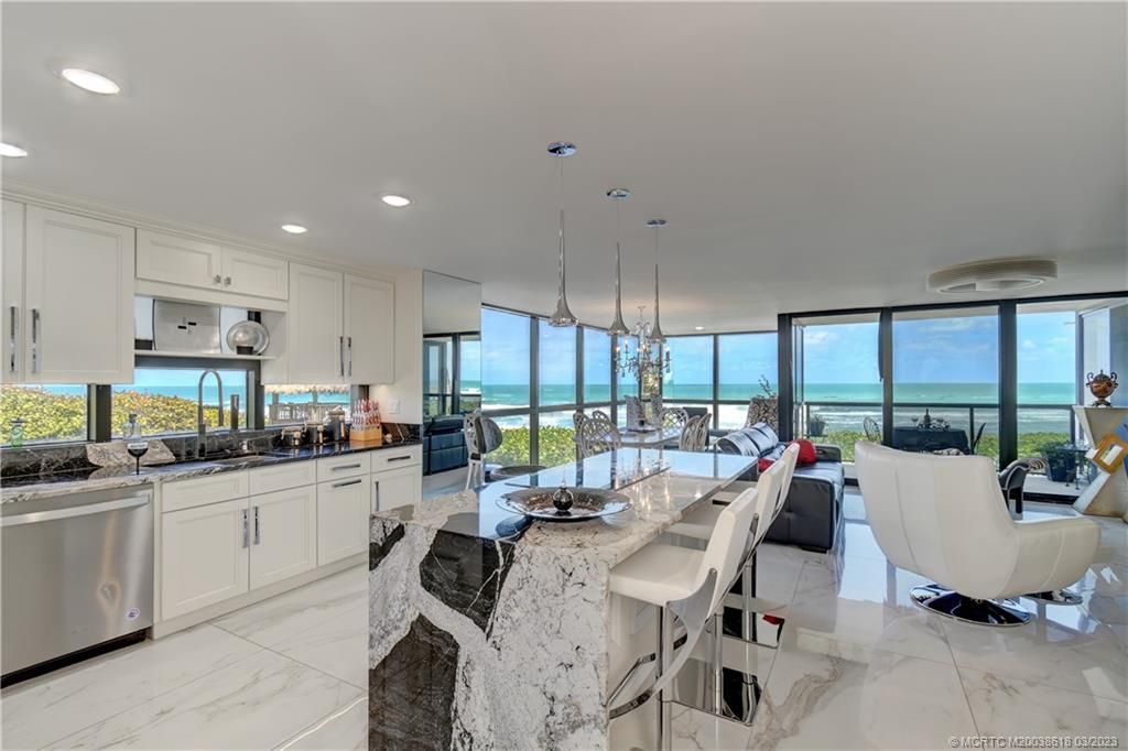 Photo of 10410 S Ocean Drive #201, Jensen Beach, FL 34957 (MLS # M20038618)