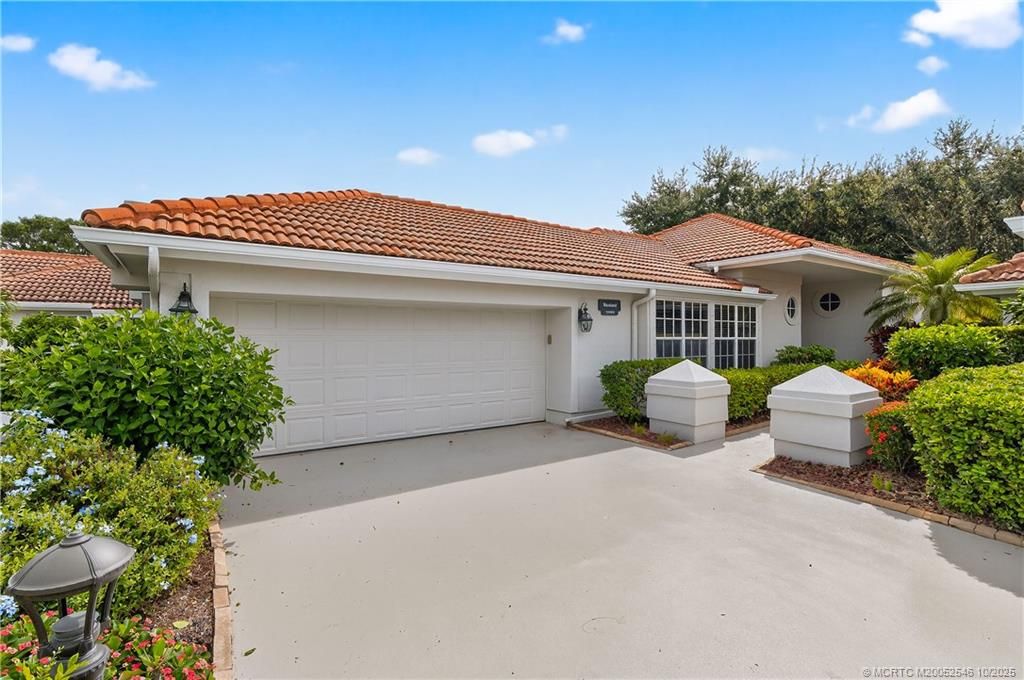 Photo of 13009 Harbour Ridge Boulevard, Palm City, FL 34990 (MLS # M20052546)