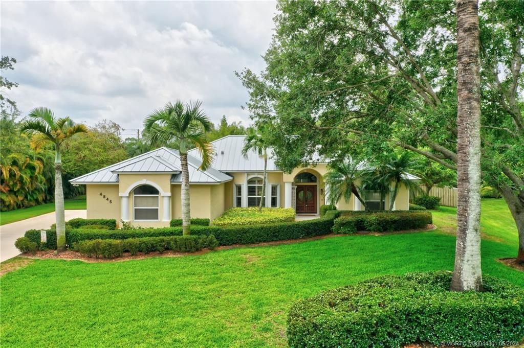 Photo of 4845 SW Lake Grove Circle, Palm City, FL 34990 (MLS # M20044301)