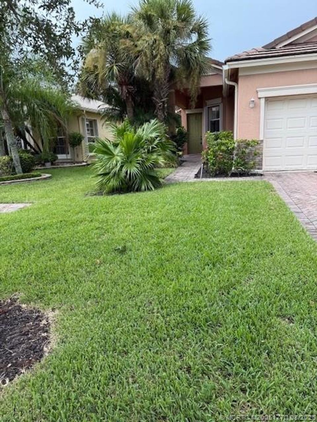 Photo of 9997 SW Stonegate Drive, Port Saint Lucie, FL 34987 (MLS # M20051770)