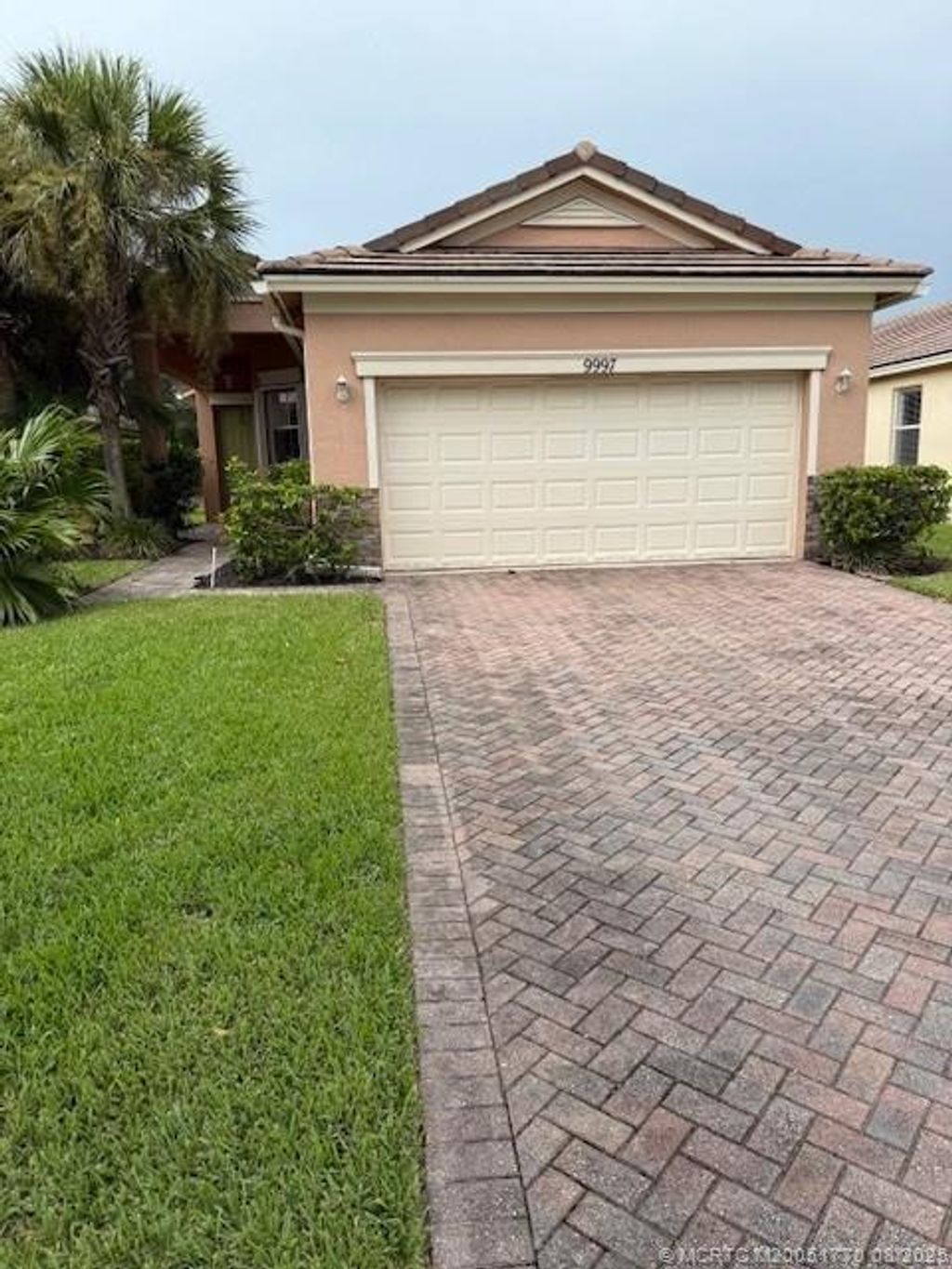 Photo of 9997 SW Stonegate Drive, Port Saint Lucie, FL 34987 (MLS # M20051770)