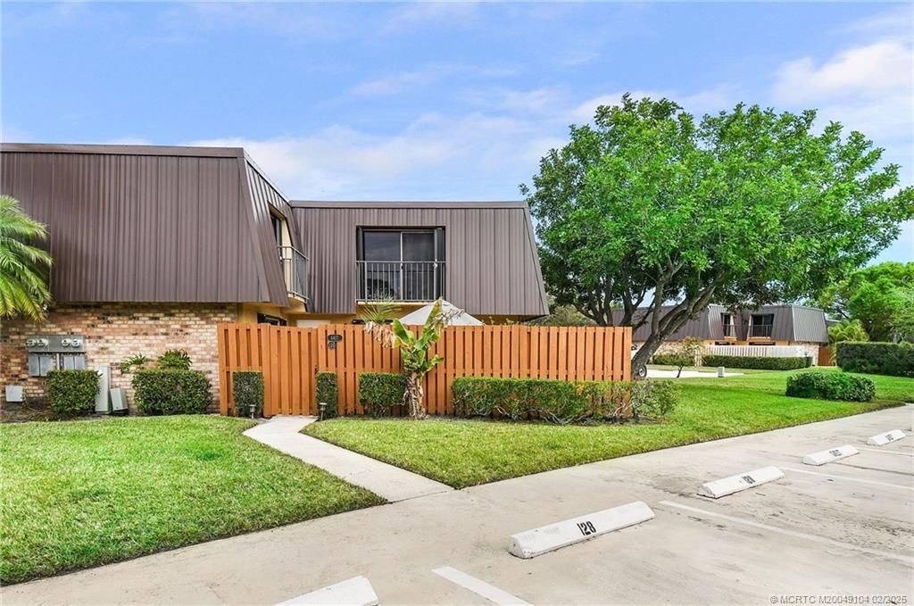 Photo of 6417 SE Windsong Lane #128, Stuart, FL 34997 (MLS # M20049104)