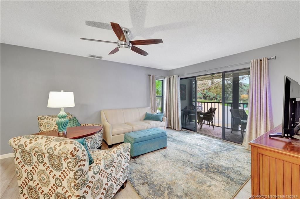 Photo of 1965 SW Silver Pine Way #118D, Palm City, FL 34990 (MLS # M20048155)