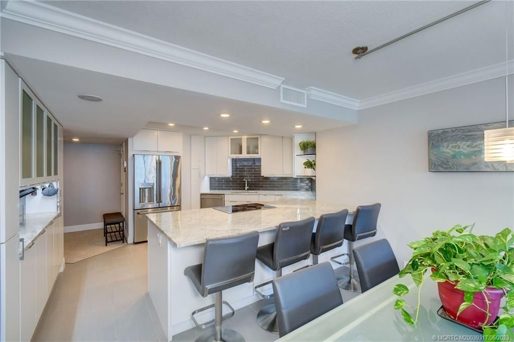 Photo of 9550 S Ocean Drive #PH-6, Jensen Beach, FL 34957 (MLS # M20039317)