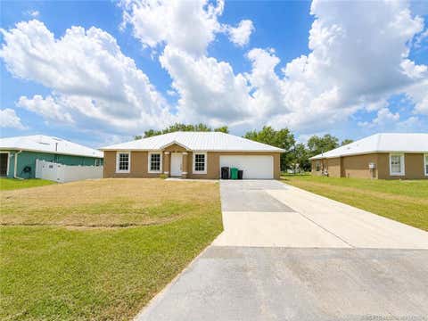 Photo of 756 SE Lansdowne Avenue, Port Saint Lucie, FL 34983 (MLS # M20056363)
