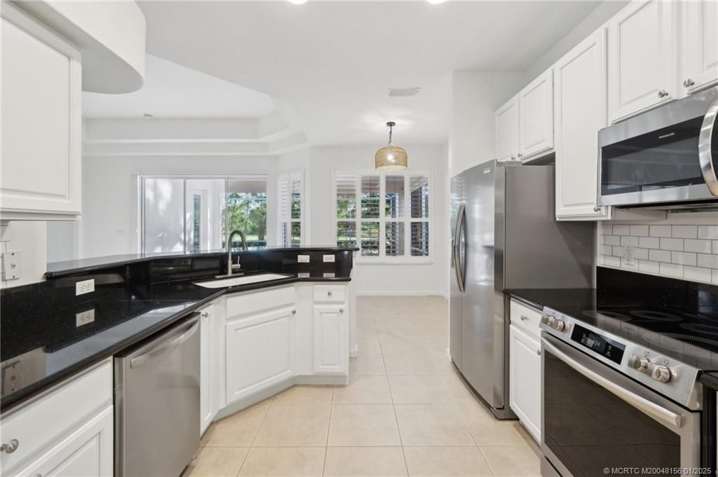 Photo of 4714 NW Red Maple Drive, Jensen Beach, FL 34957 (MLS # M20048156)