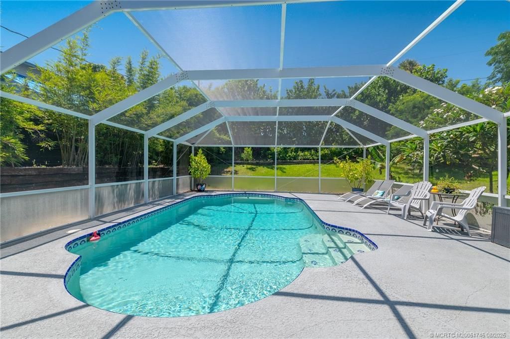 Photo of 1065 NE Oceanview Circle, Jensen Beach, FL 34957 (MLS # M20051745)