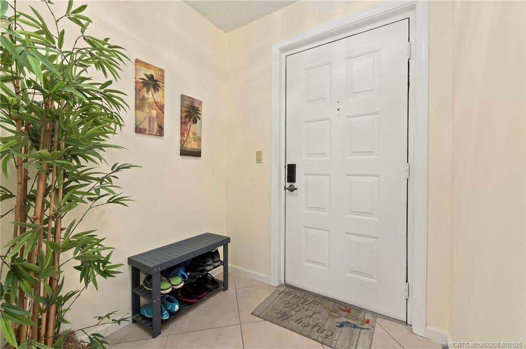 Photo of 3100 SE Pruitt Road #A305, Port Saint Lucie, FL 34952 (MLS # M20056226)