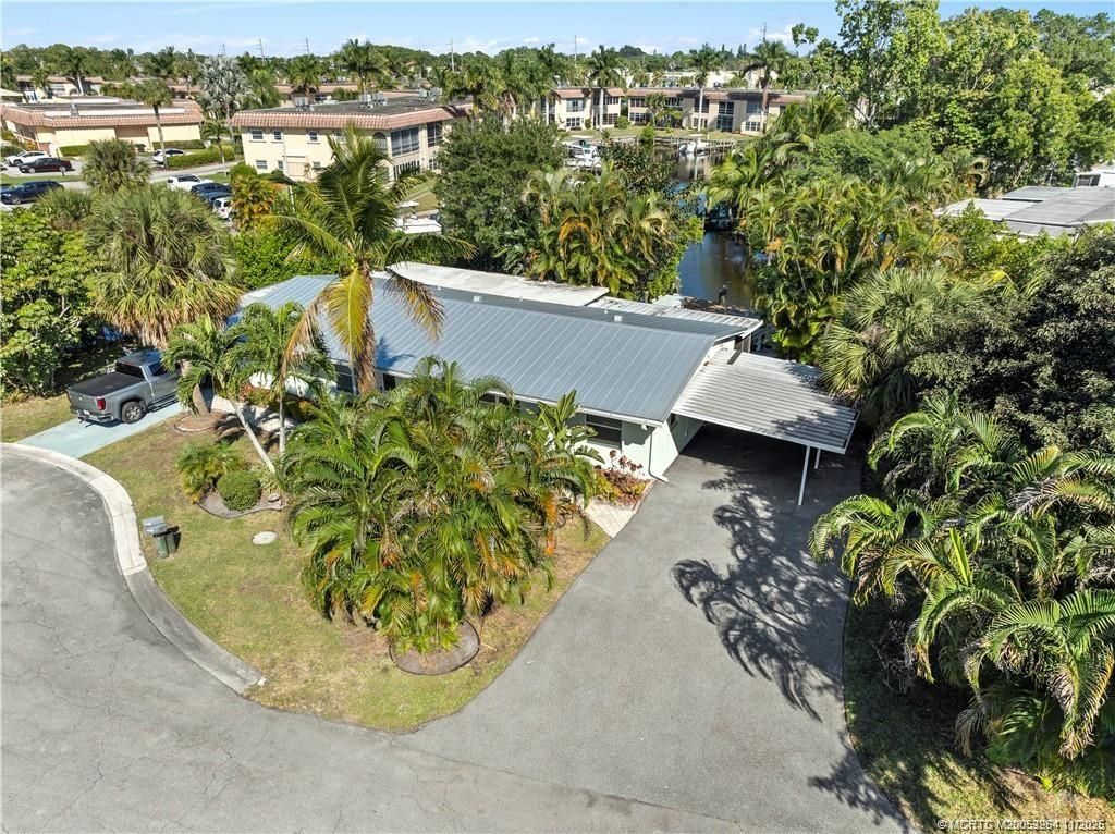 Photo of 2425 SW Hideaway Lane, Stuart, FL 34994 (MLS # M20053264)