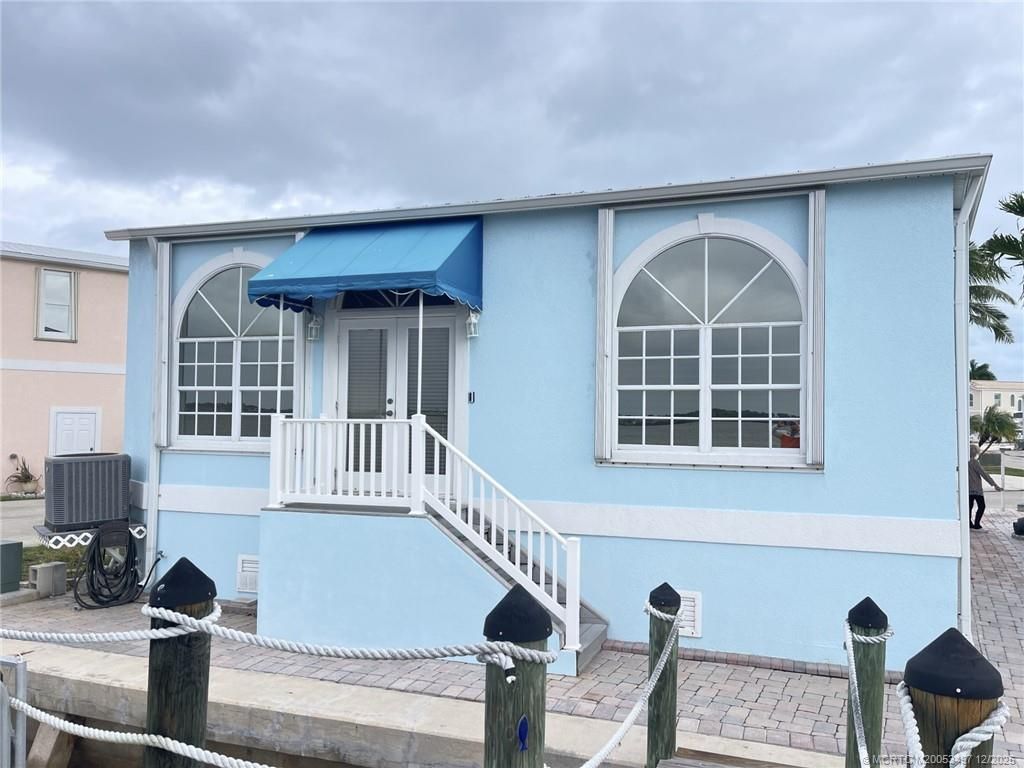 Photo of 1116 Nettles Boulevard, Jensen Beach, FL 34957 (MLS # M20053497)