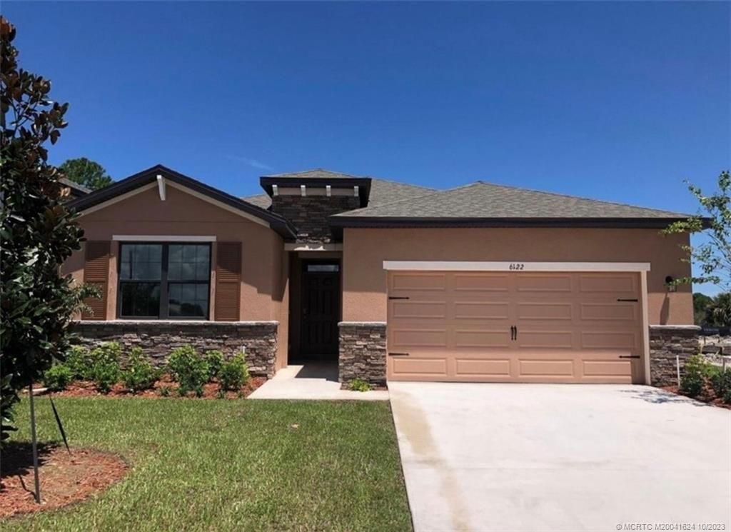 Photo of 6122 NW Regent Street, Port Saint Lucie, FL 34983 (MLS # M20041624)