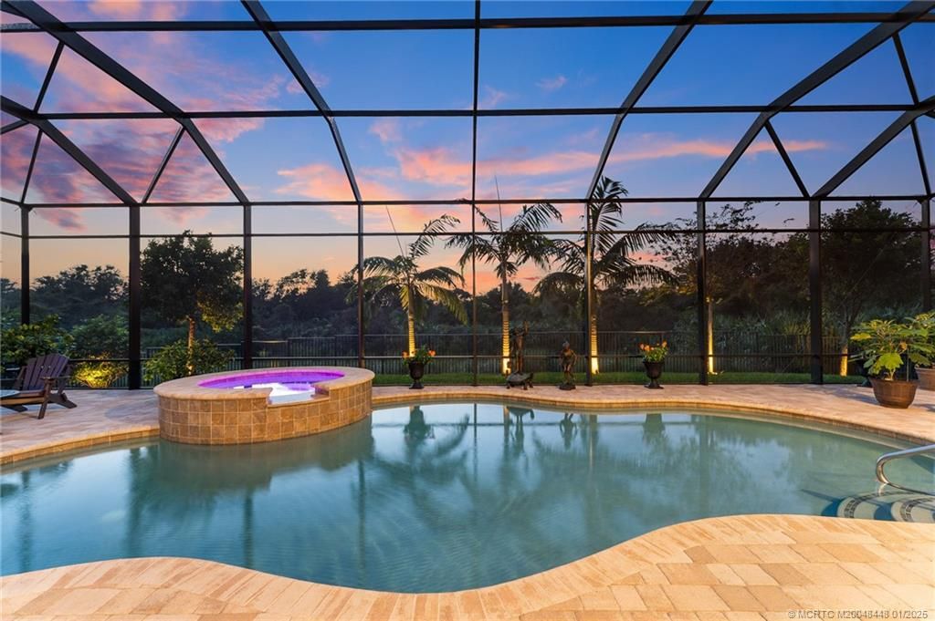 Photo of 1440 NE Langford Lane, Jensen Beach, FL 34957 (MLS # M20048448)