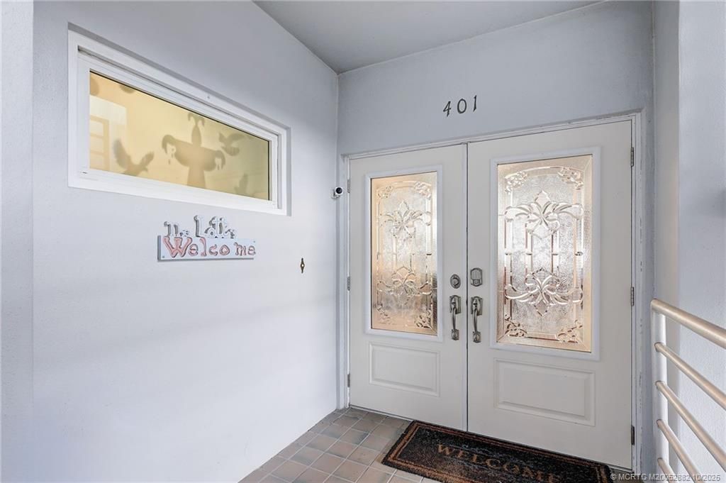 Photo of 1140 SW Chapman Way #401, Palm City, FL 34990 (MLS # M20052882)