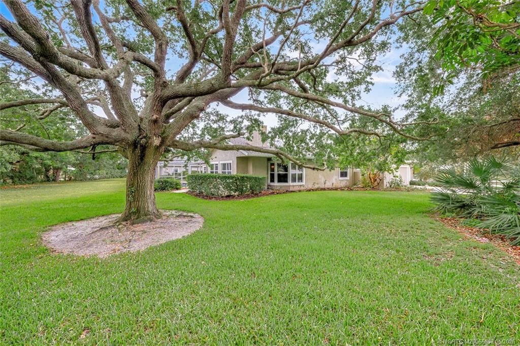 Photo of 2671 NE Pinecrest Lakes Boulevard, Jensen Beach, FL 34957 (MLS # M20055638)