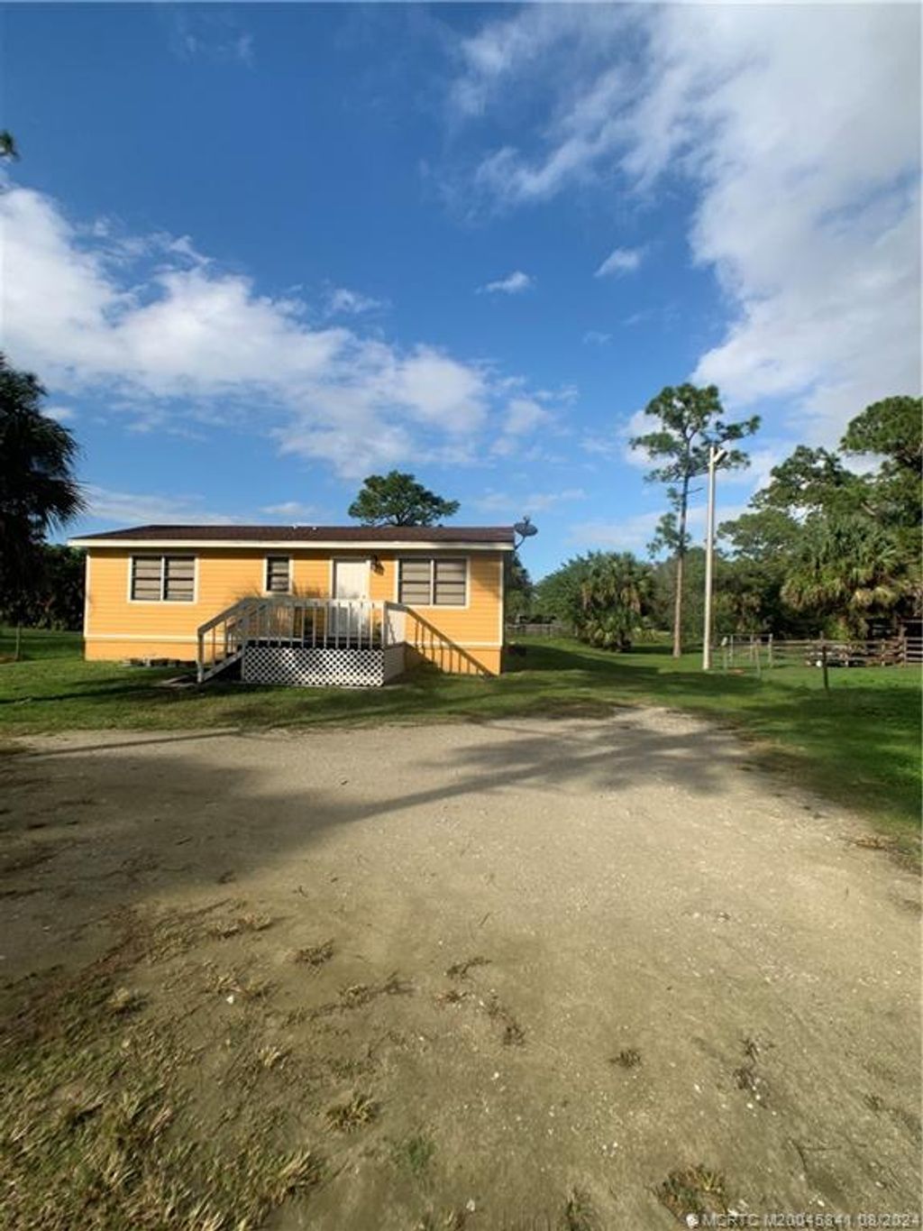 Photo of 6105 SW Gator Trail, Palm City, FL 34990 (MLS # M20045841)