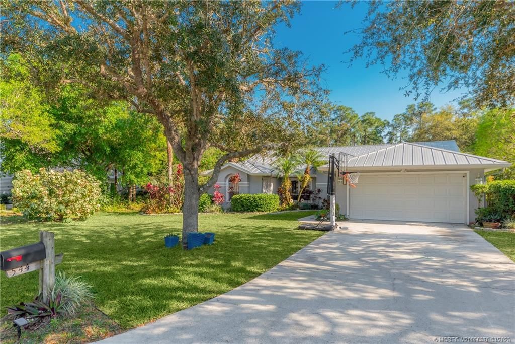 Photo of 544 SE Meadow Wood Way, Stuart, FL 34997 (MLS # M20038378)