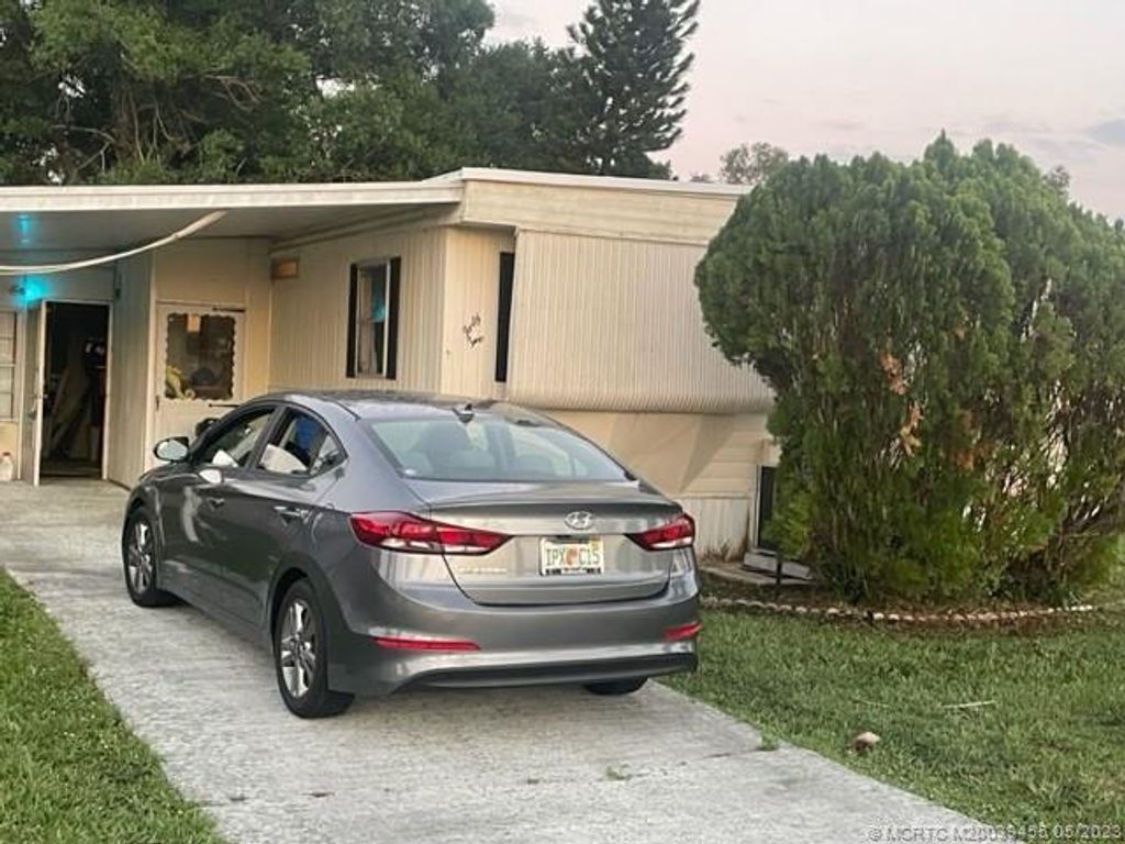 Photo of 42 Golf Drive, Port Saint Lucie, FL 34952 (MLS # M20039455)