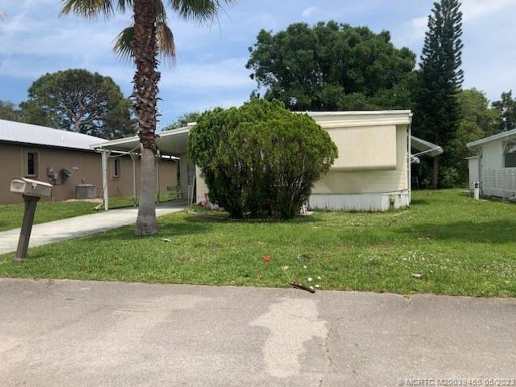 Photo of 42 Golf Drive, Port Saint Lucie, FL 34952 (MLS # M20039455)