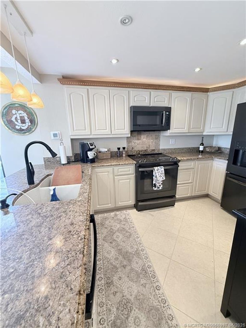 Photo of 10600 S Ocean Drive #7, Jensen Beach, FL 34957 (MLS # M20050997)